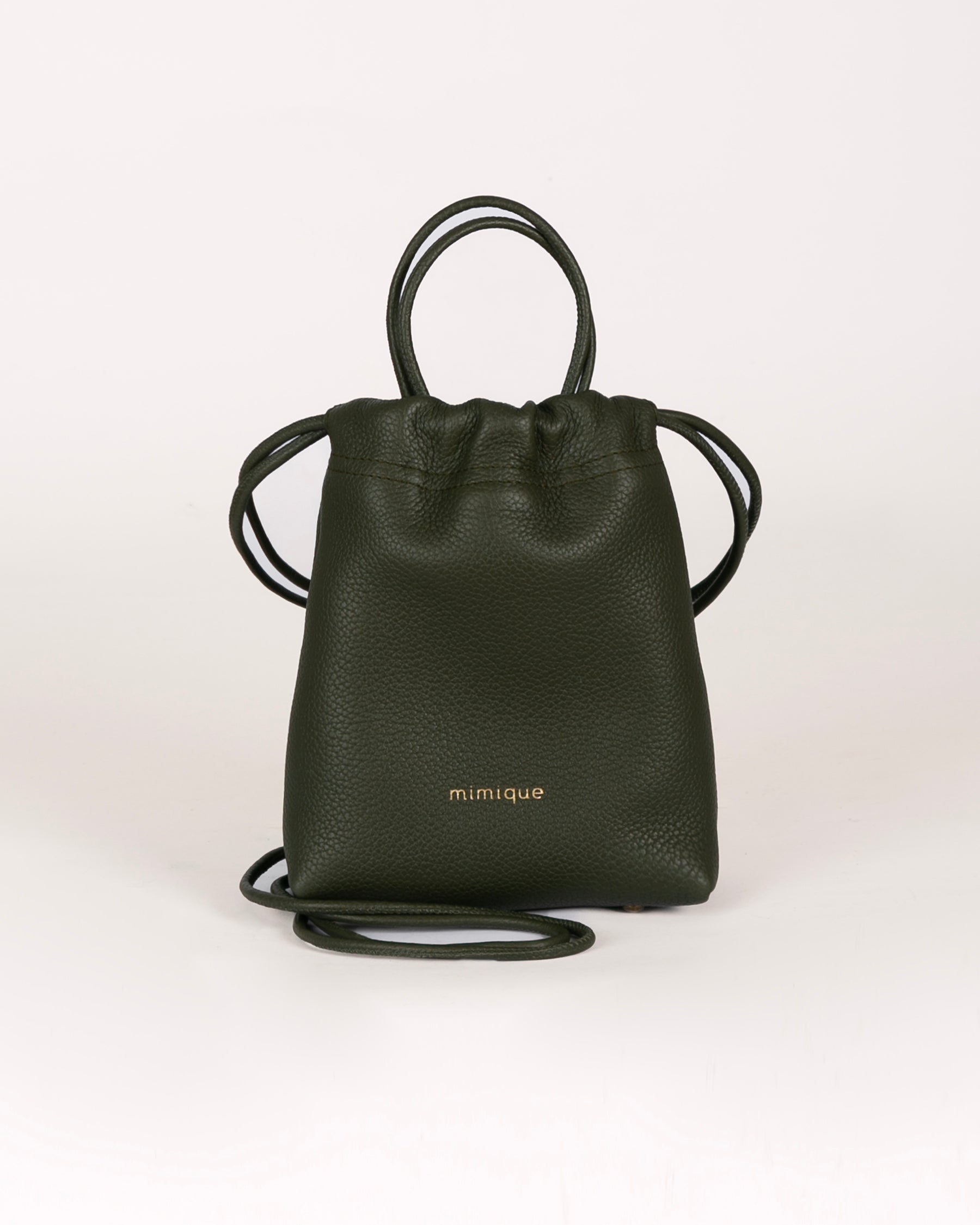 Mini bolso bandolera de piel caqui Cue Mimique gran capaciad hecho en España