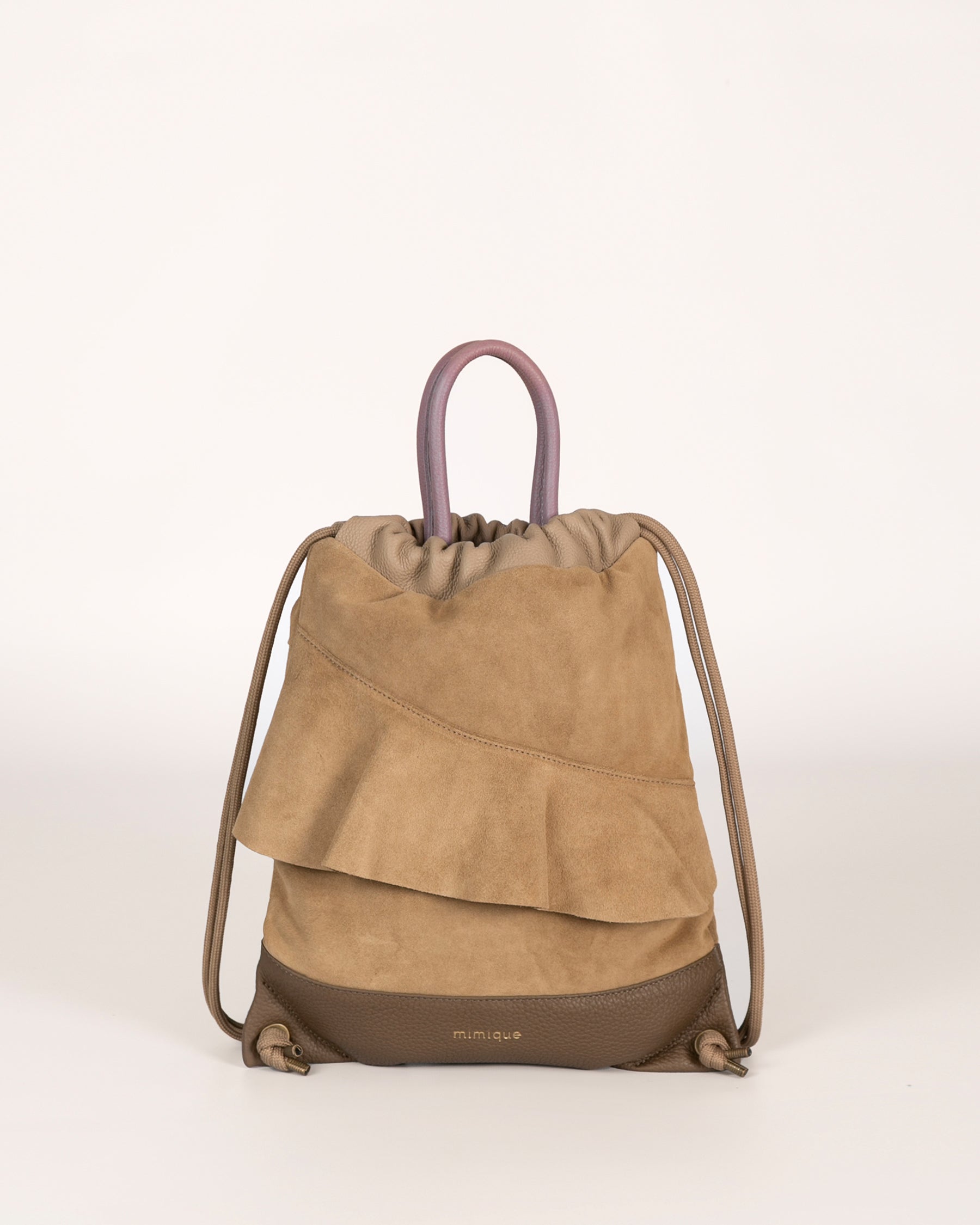Mochila bolso Bolonia mini topo marrón  de Mimique en piel y serraje. Made in Spain
