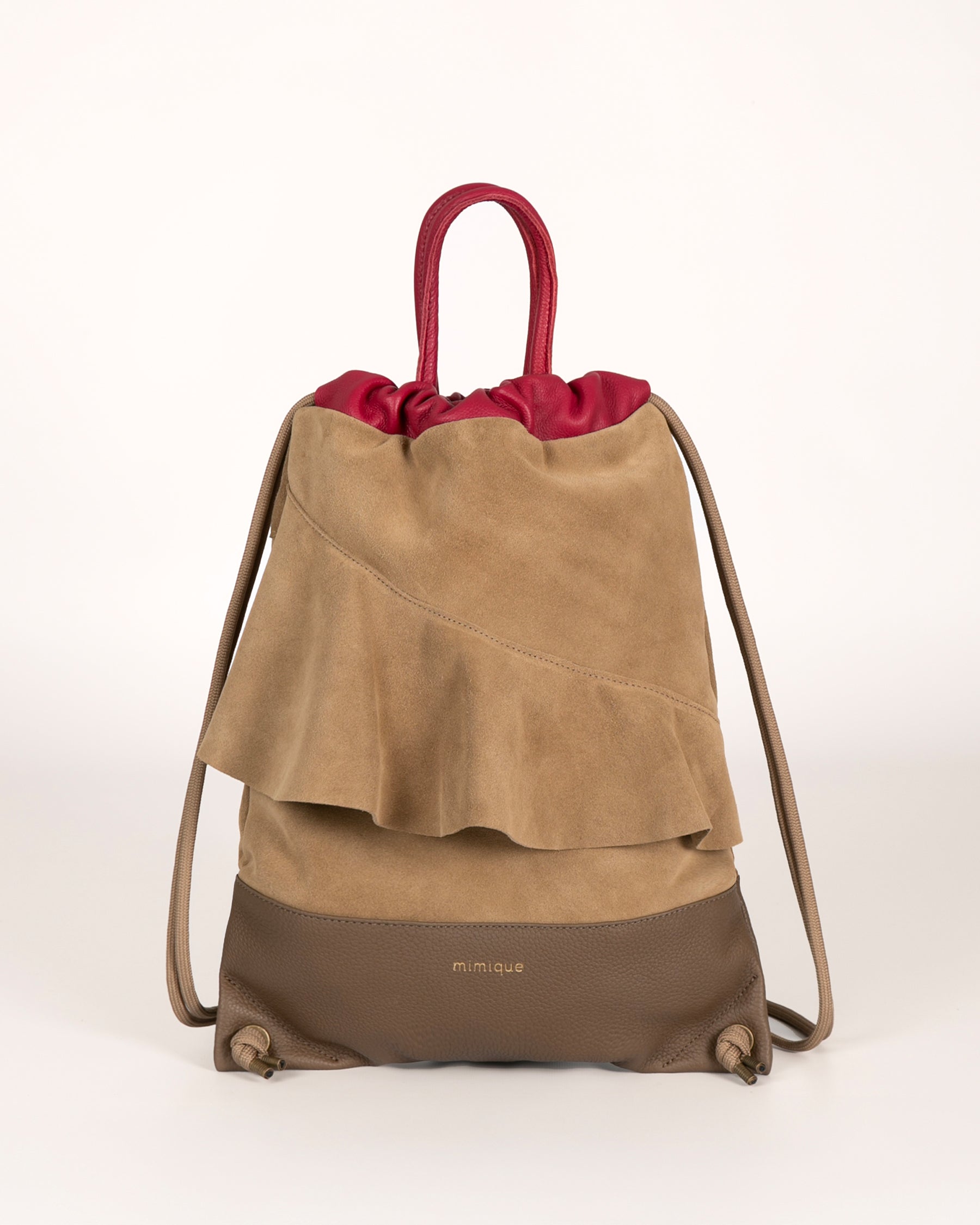 Mochila para mujer de piel y serraje ante Bolonia Mimique con volante topo