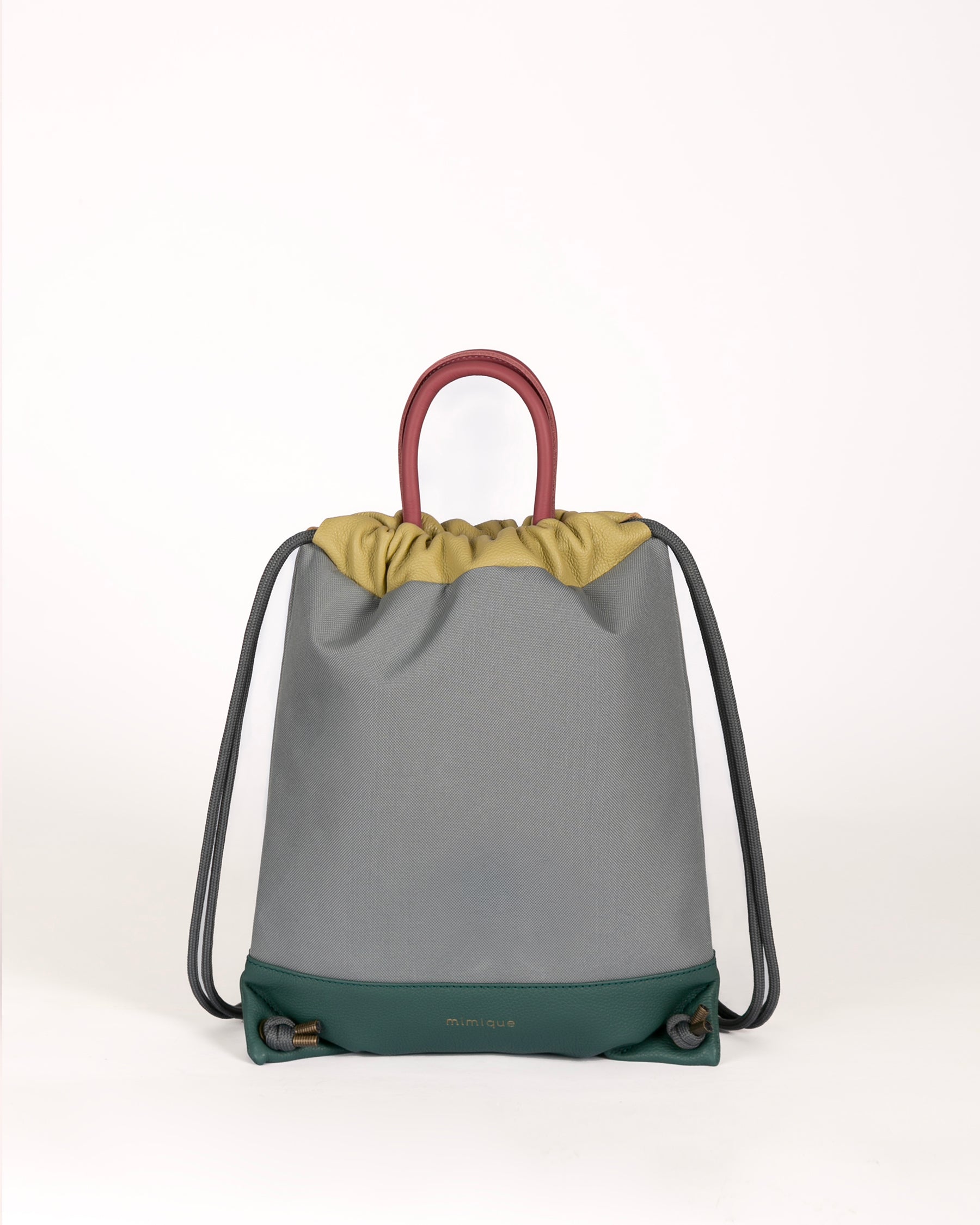 Mochila bolso Atalaya de Mimique gris para mujer de piel y loneta impermeable