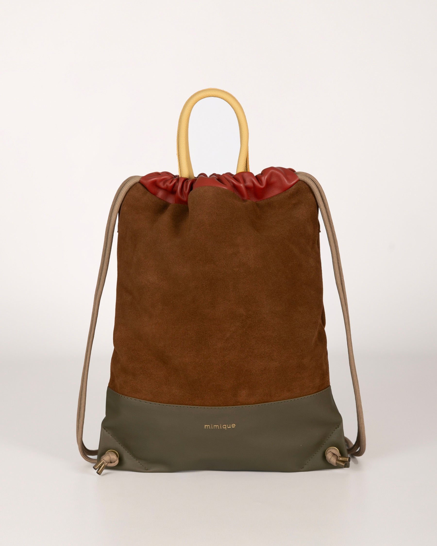 Mochila de mujer de piel y ante Arra Mimique. Marrón. Calidad made in spain