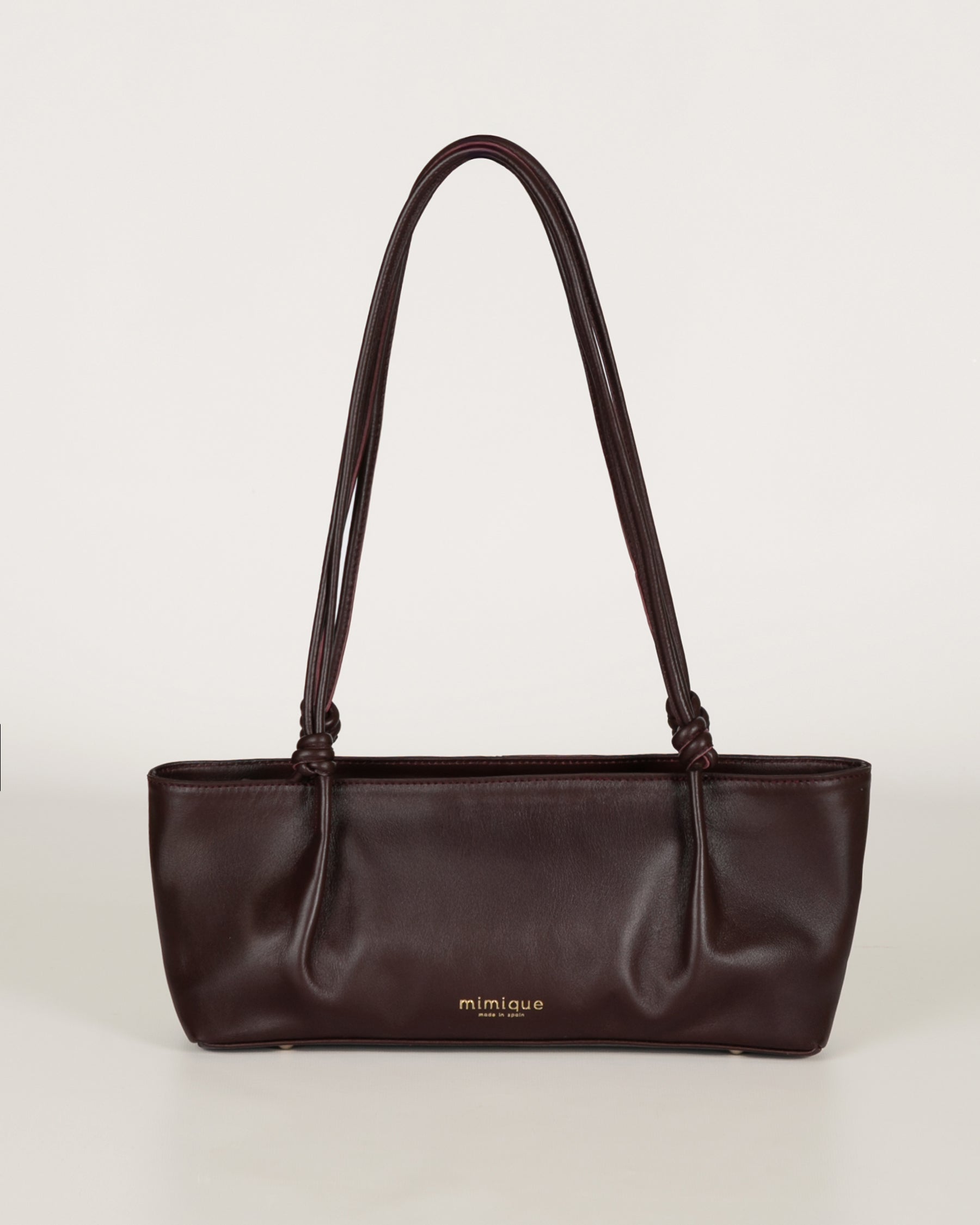 Bolso baguette de mujer Toranda en piel de máxima calidad burdeos. Cómodo, ligero y atemporal. Hecho a mano en España - Mimique