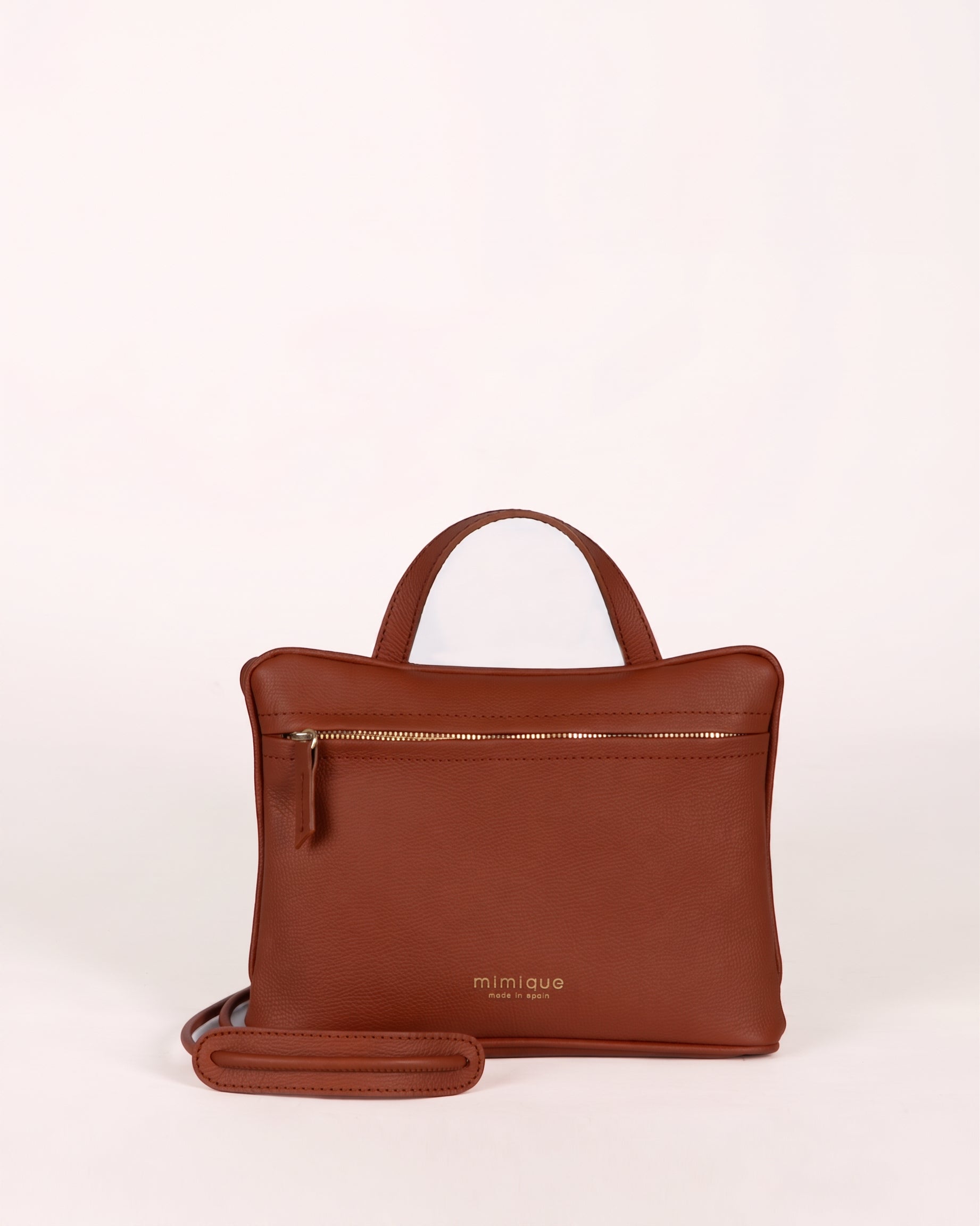 Bolso América cuero Mimique hecho a mano en España con diseño clásico tipo sobre y forma rectangular con cremallera invisible