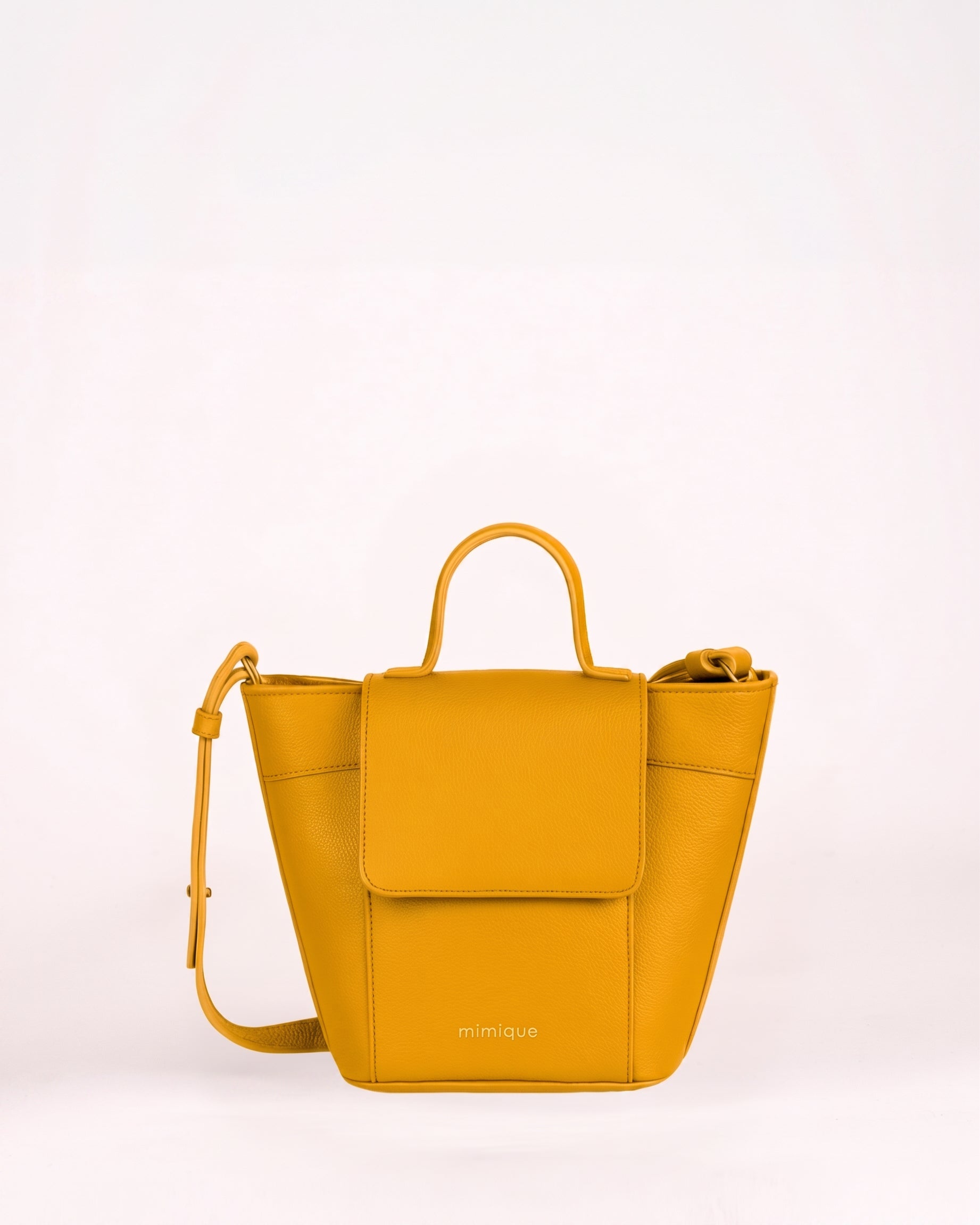 Bolso bandolera con tapa Andrín mini Mimique color mostaza piel de máxima calidad