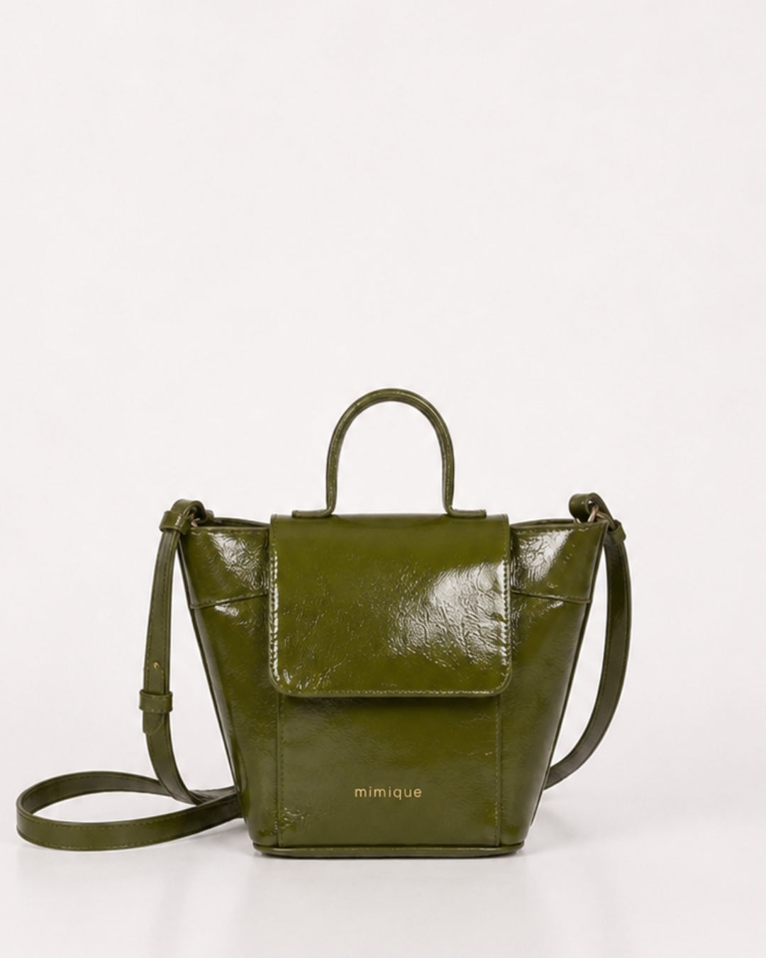 Andrín mini verde musgo charol bolso bandolera para mujer de Mimique con tapa y cremallera made in Spain