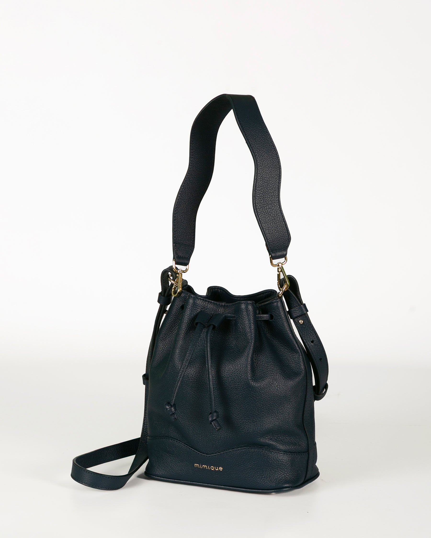 Bolso bombonera para mujer Serín de Mimique en piel premium color azul marino navy. Bandolera regulable