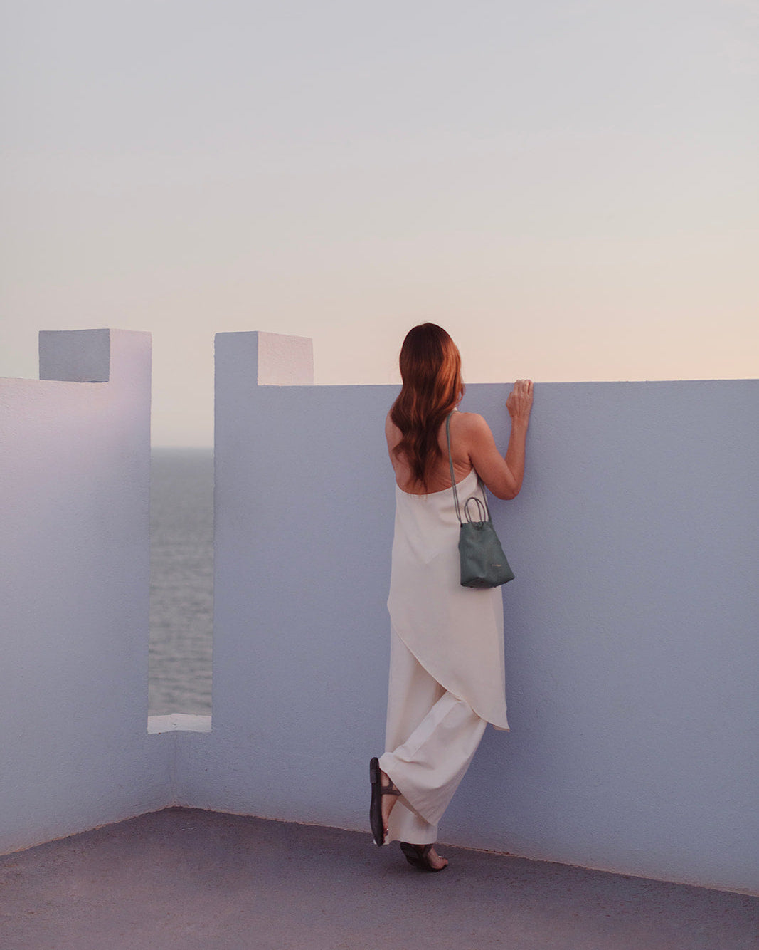 Bolso bombonera Mimique Cue en verde aguamarina, piel de gran calidad, bandolera cómoda y ligera hecha a mano en España