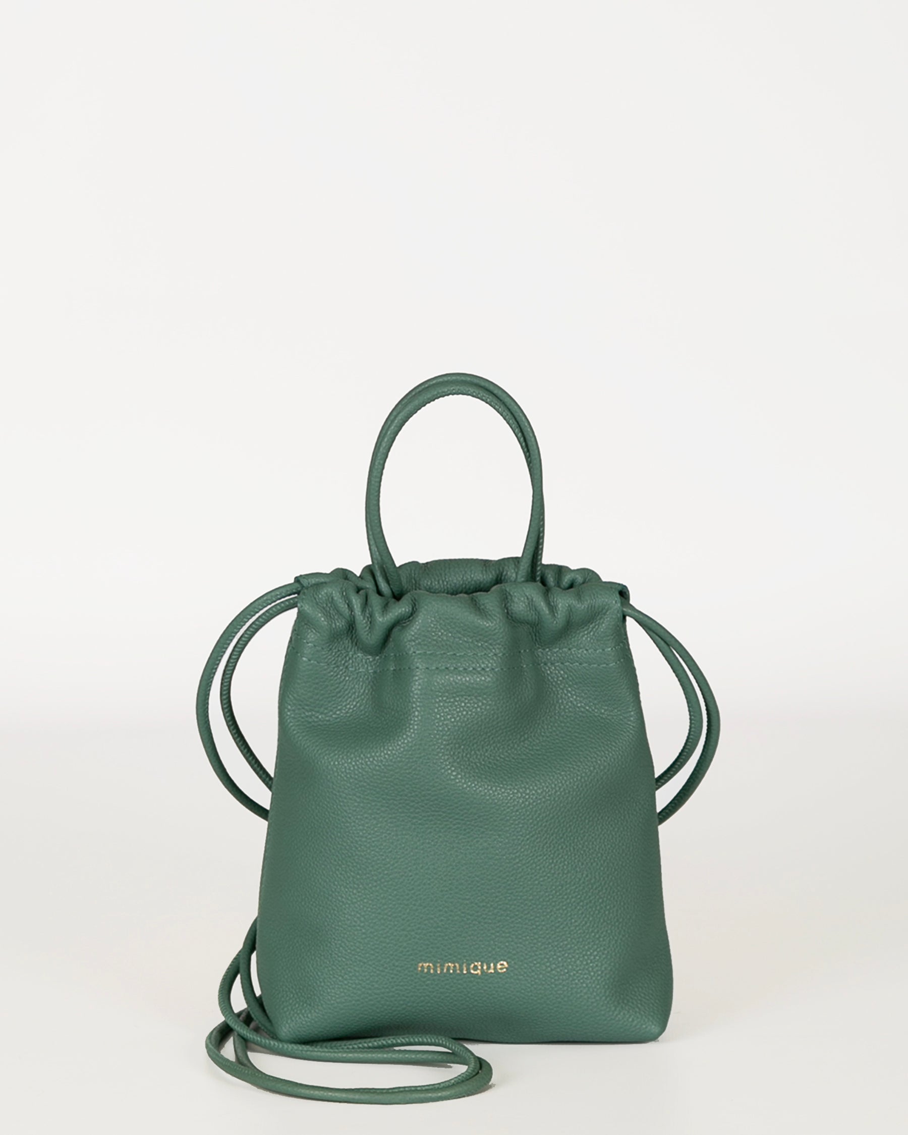 Bolso bombonera Cue color verde aguamarina para mujer en piel de gran calidad. Con bandolera y asa de mano. Made in Spain - Mimique