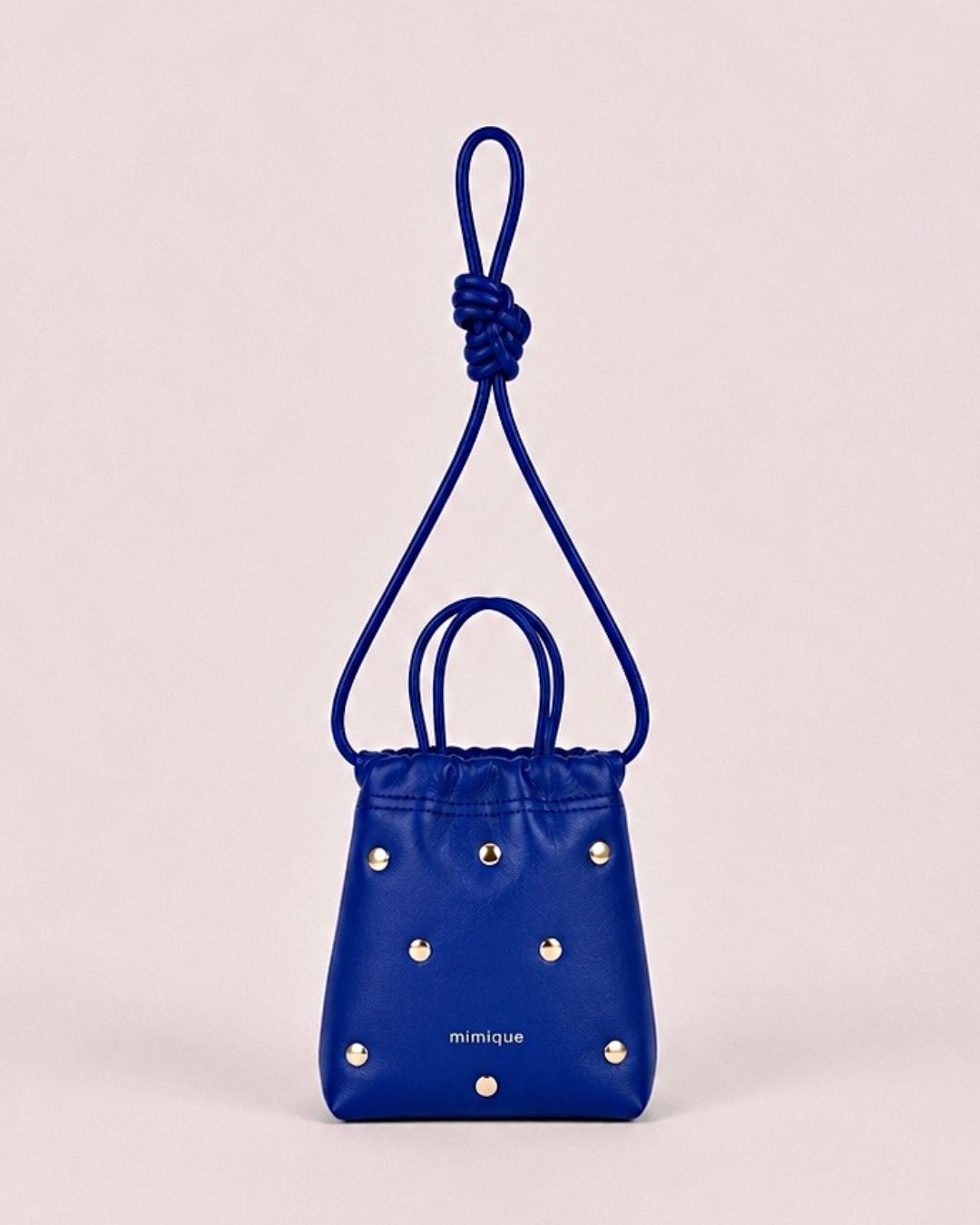 Cue azul eléctrico dots mini bombonera de piel cómoda y muy ligera con gran capacidad