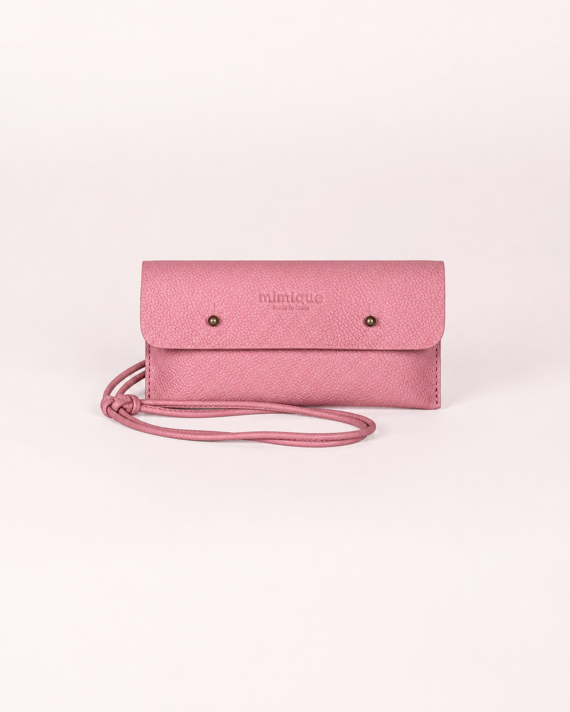 Funda de móvil de piel rosa salmón caballa Mimique con cordón regulable bandolera made in Spain