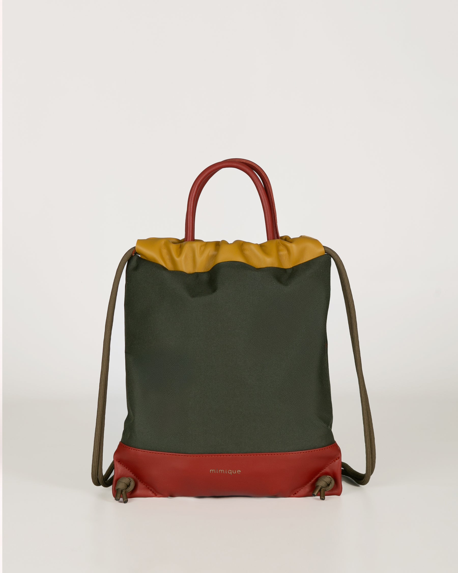 Bolso mochila impermeable para mujer ligera Atalaya de Mimique. Color verde caqui y mostaza. Alta calidad Made in Spain