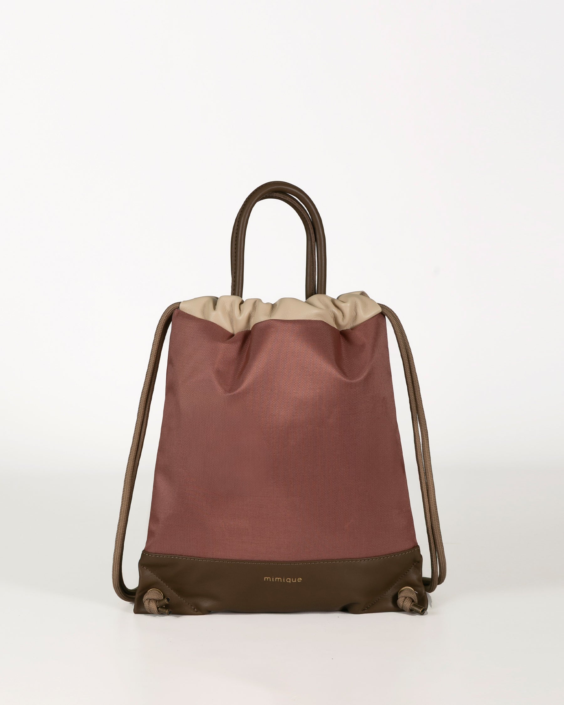 Mochila bolso de piel y loneta impermeable Atalaya Mimique rosa hecha a mano en España