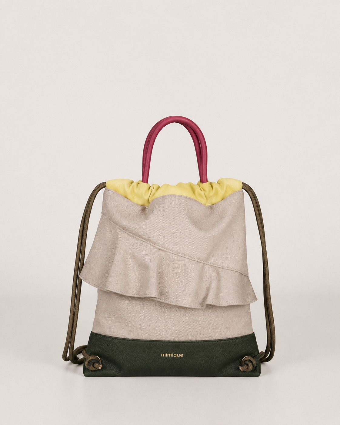 Mochila bolso de piel y loneta impermeable beige con volante para mujer Zahora mini de Mimique. Hecha de forma artesanal en España
