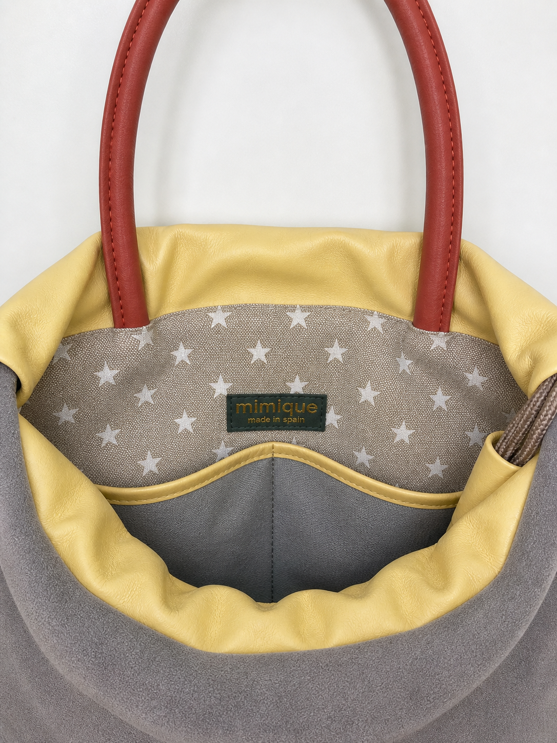 Arra gris Mimique mochila bolso tamaño grande para mujer hecha a mano en España gran calidad y capacidad