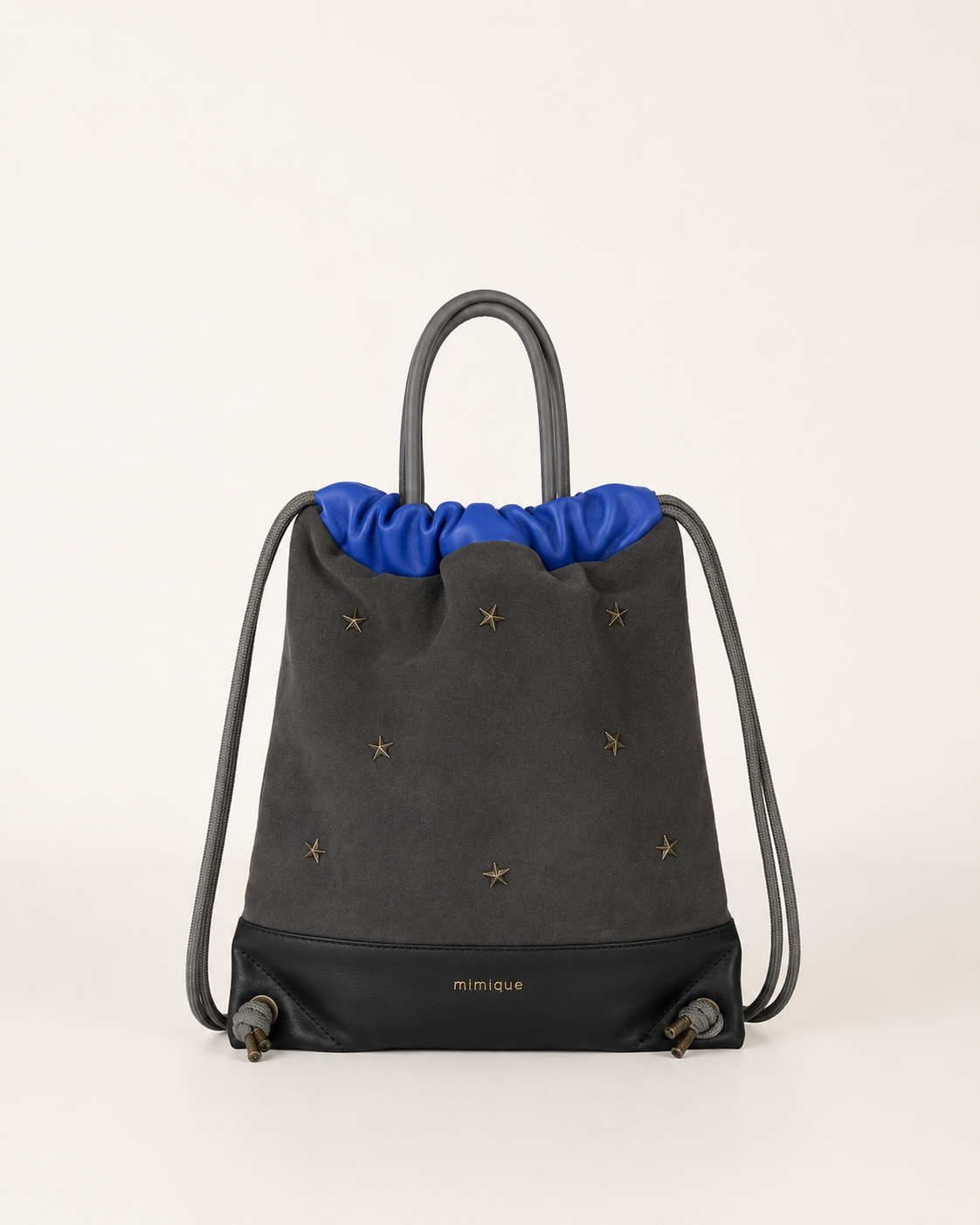 Mochilas para mujer Tachuelas mini Mimique en piel y serraje gris oscuro y azul klein made in Spain