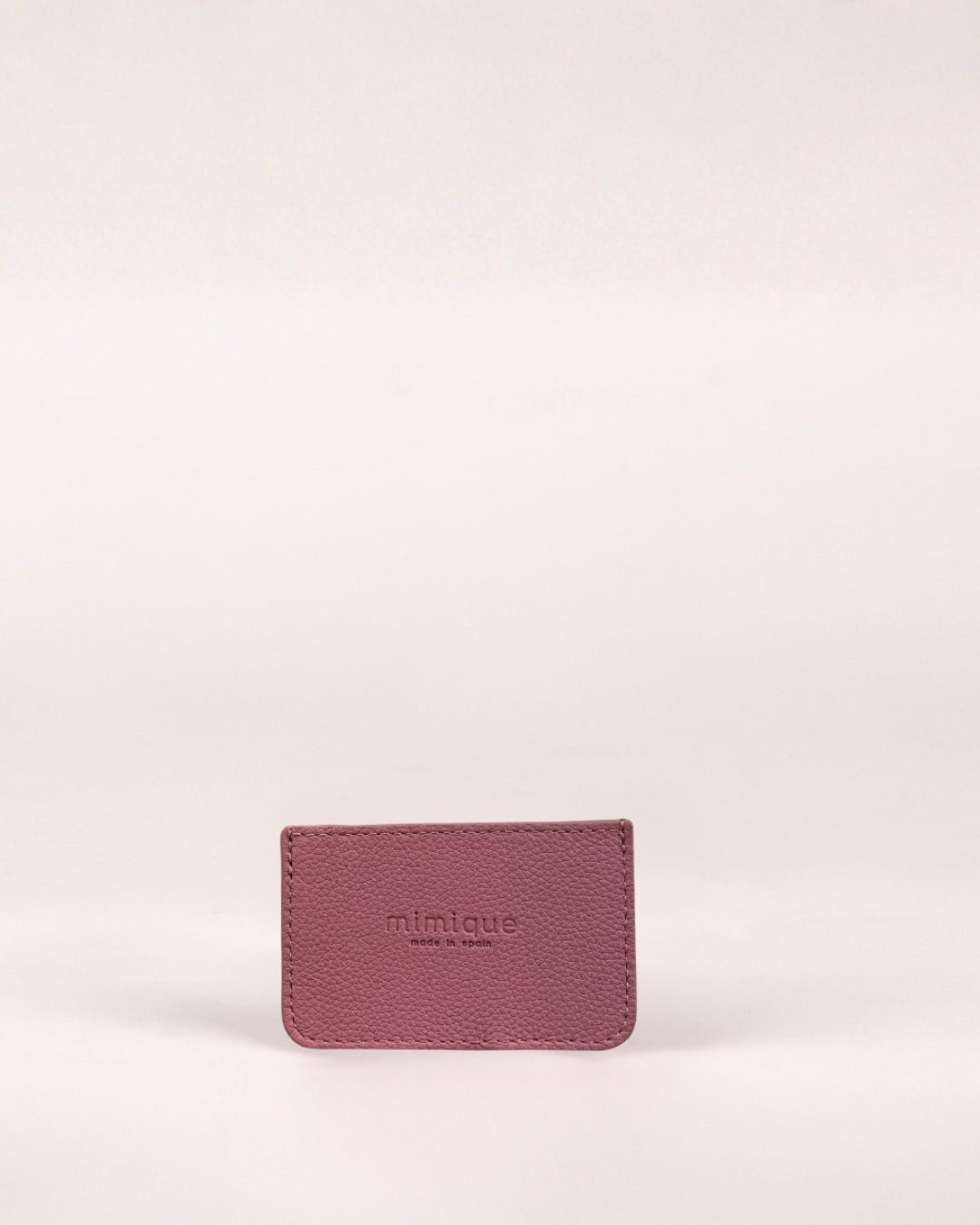 Tarjetero de piel Mimique color caballa rosa hecho a mano en España en piel de alta calidad diseño compacto, práctico y elegante