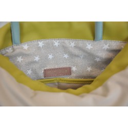Mochila bolso de piel con volante para mujer Mimique - Hecho en España. loneta impermeable