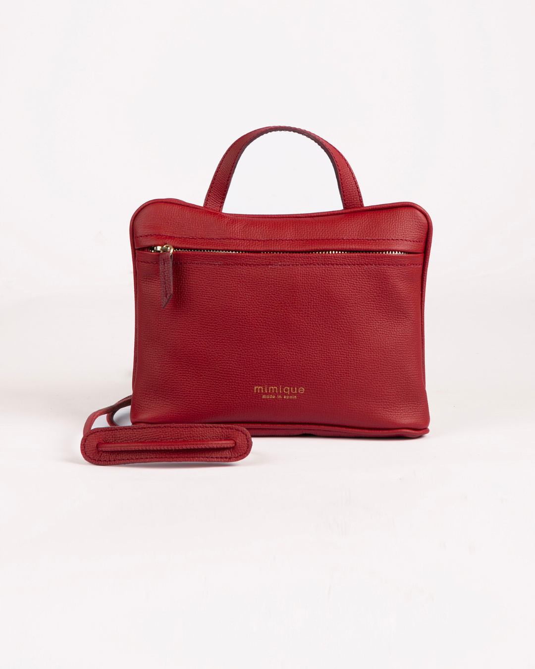 Bolso sobre bandolera América de Mimique. Piel color rojo guinda. Made in Spain