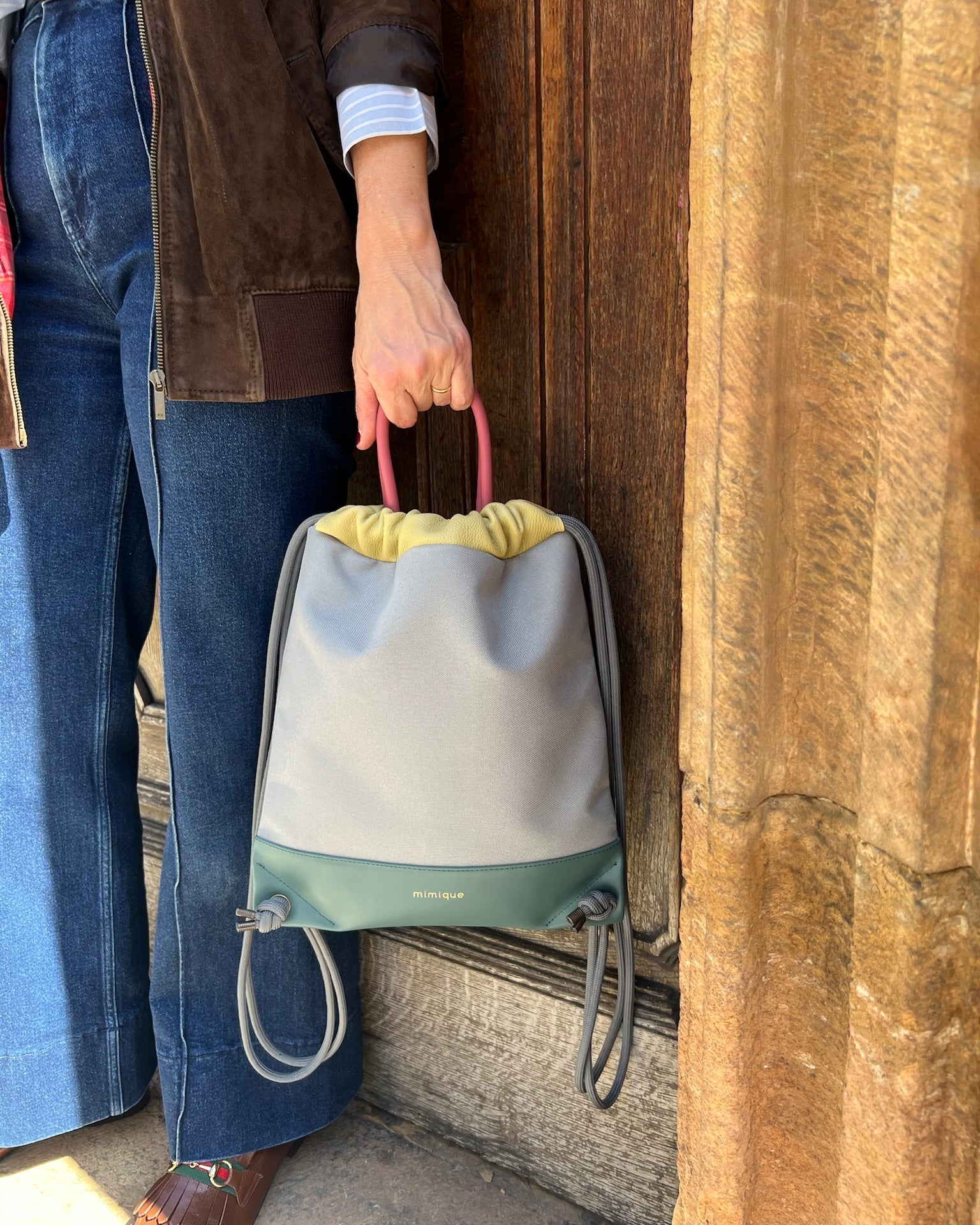 Mochila bolso Atalaya de Mimique gris para mujer de piel y loneta impermeable