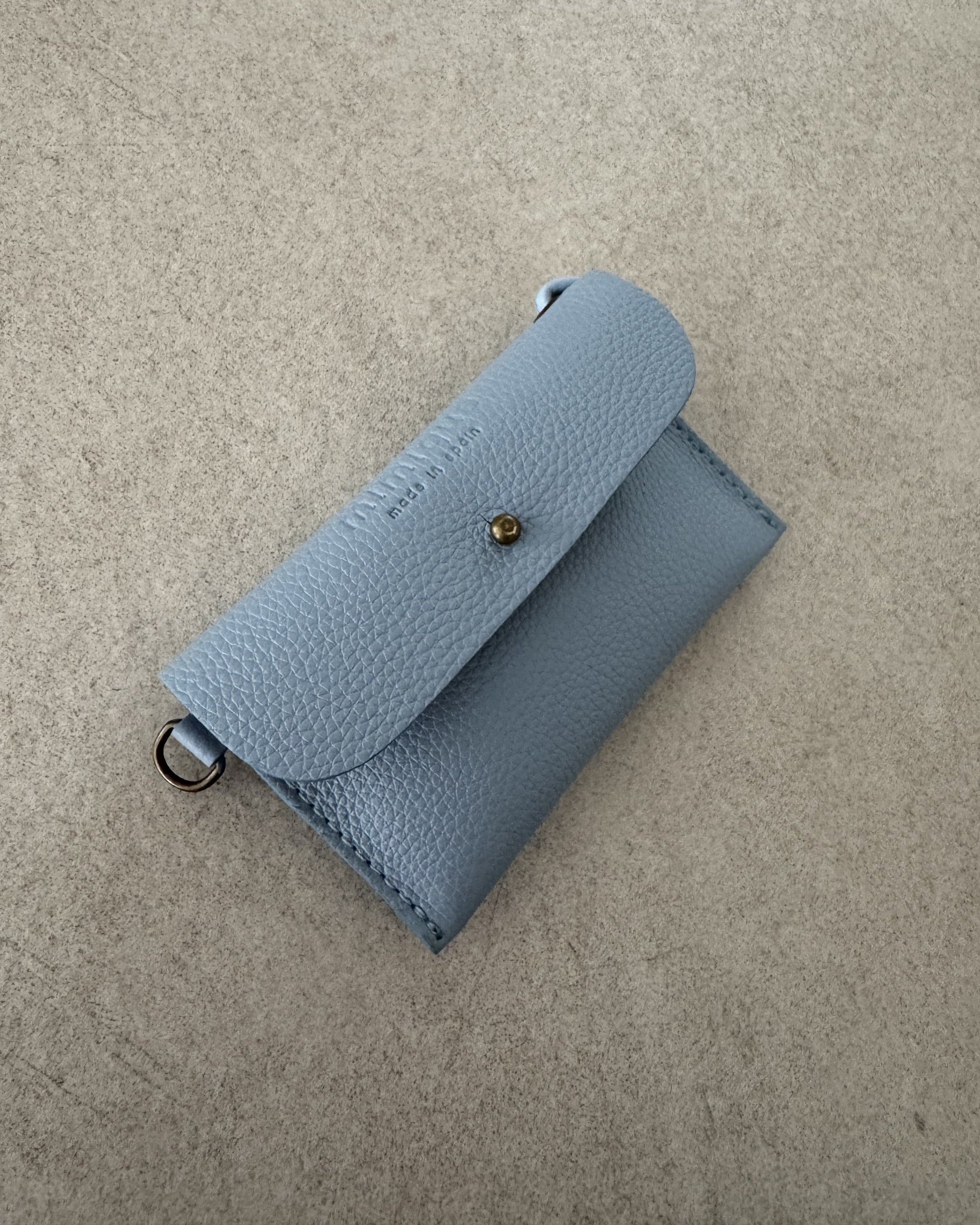 Funda multiuso Mimique de piel azul, calidad Made in Spain