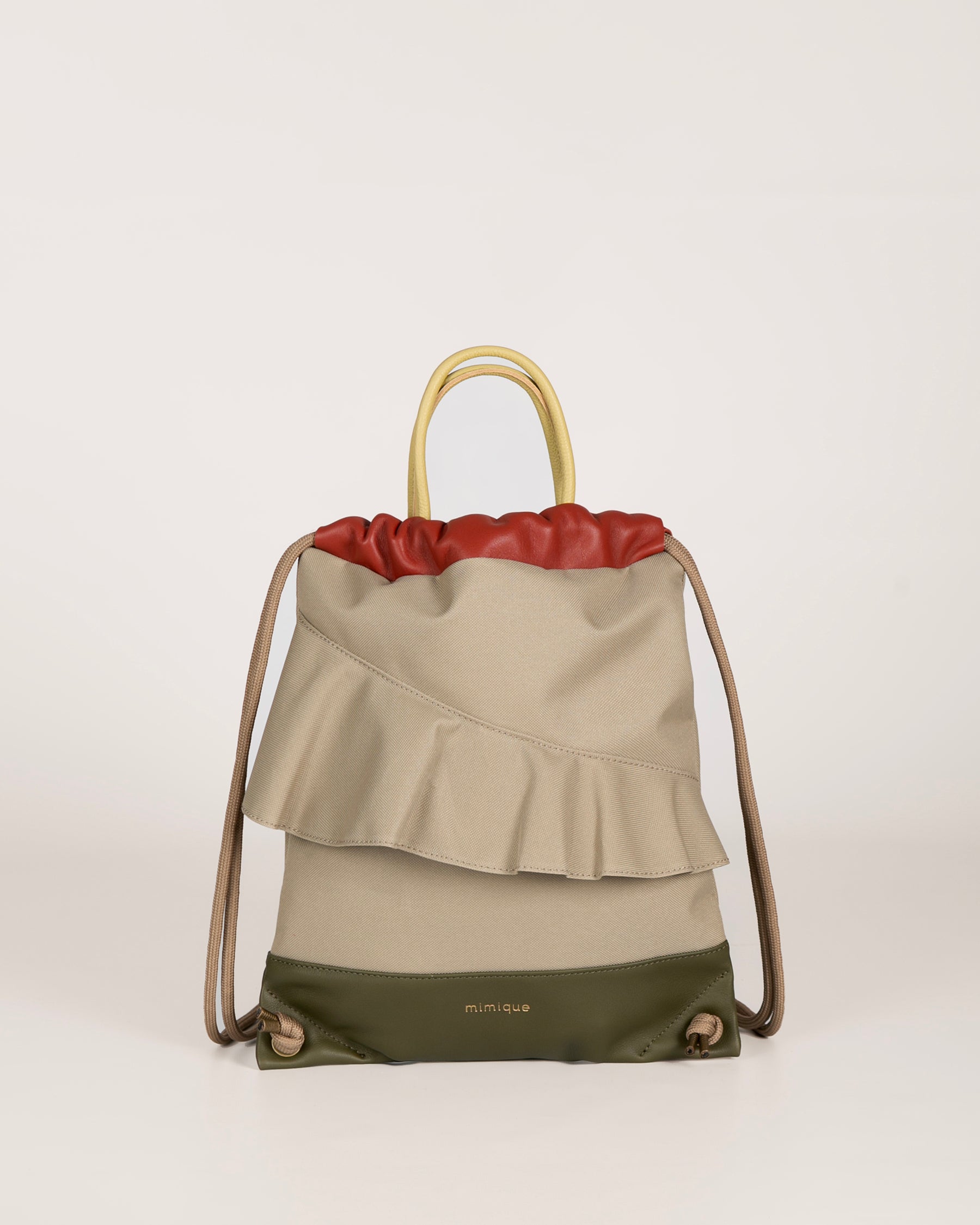 Mochila mediana de loneta impermeable Zahora mini de Mimique. Volante beige