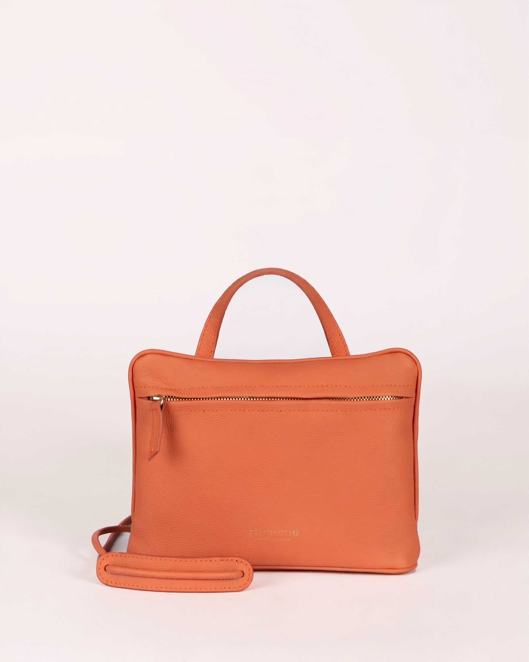 Bolso América Mimique en color salmón rosa coral, cierre con cremallera, bolsillo interior, cómodo, ligero y con gran capacidad