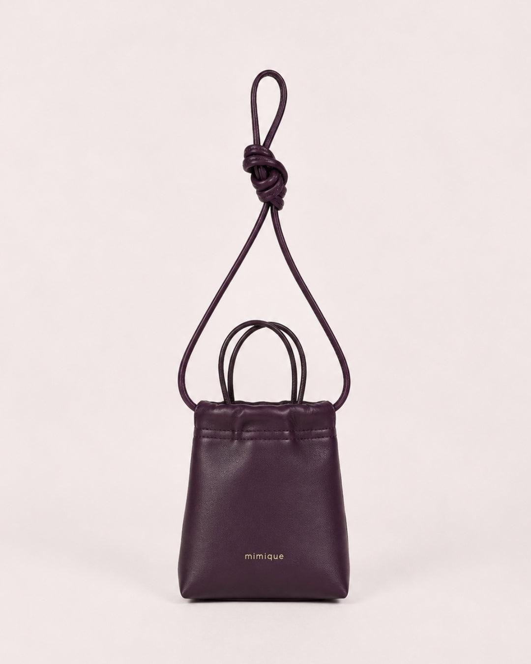 Cue berenjena bolso bombonera para mujer de Mimique en piel de máxima calidad cómoda, muy ligera y con gran capacidad