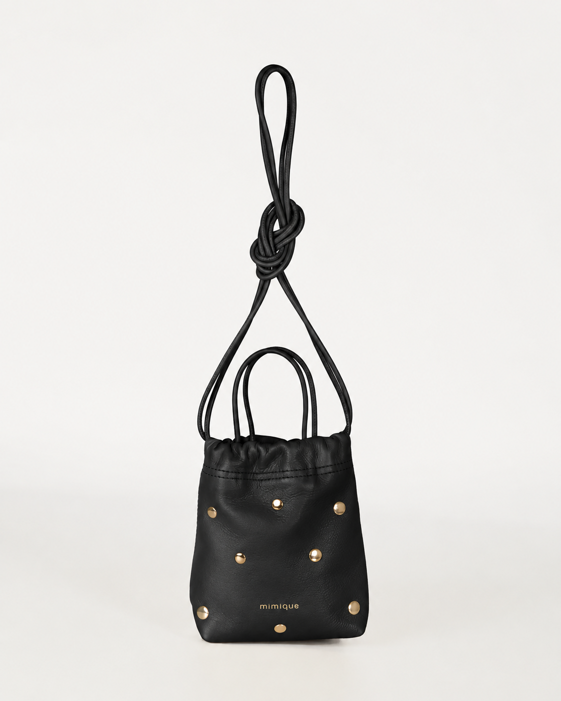Bolso bandolera Cue dots negro en piel para mujer de Mimique cómodo y ligero hecho a mano en España