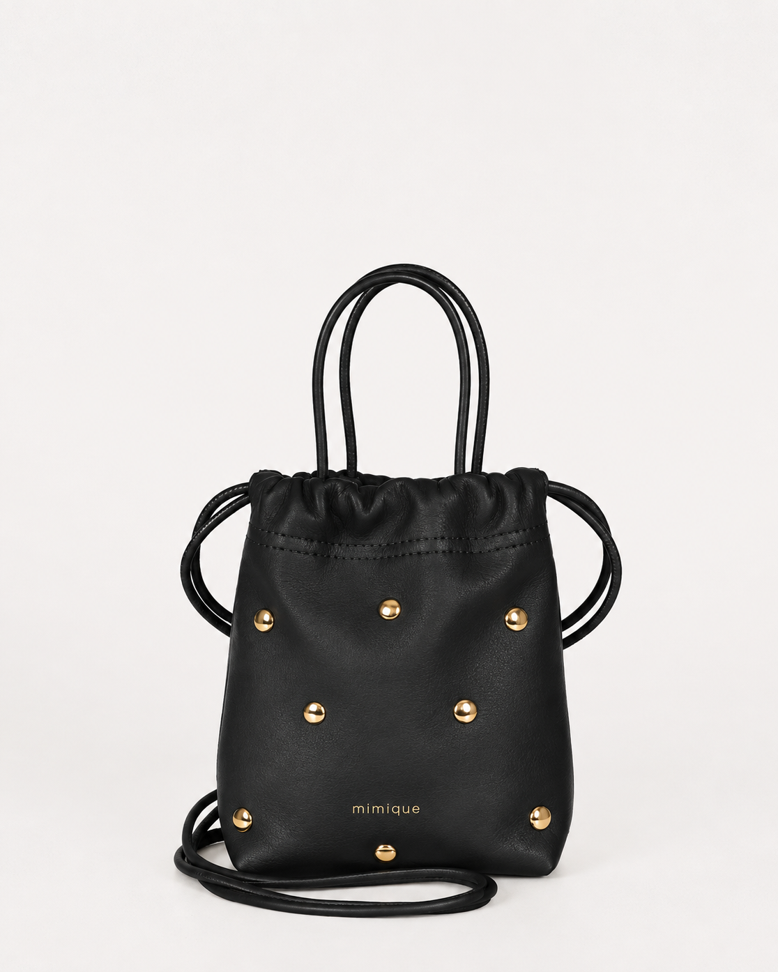 Cue dots negro mini bombonera de piel para mujer de Mimique con gran capacidad hecho a mano en España