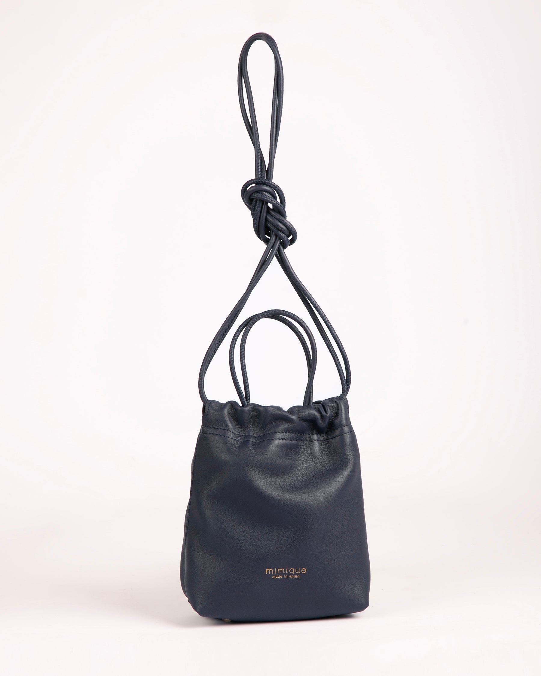 Bolso bombonera para mujer Cue de Mimique en piel navy azul marino de gran calidad. Bandolera con asa de mano. Cierre seguro