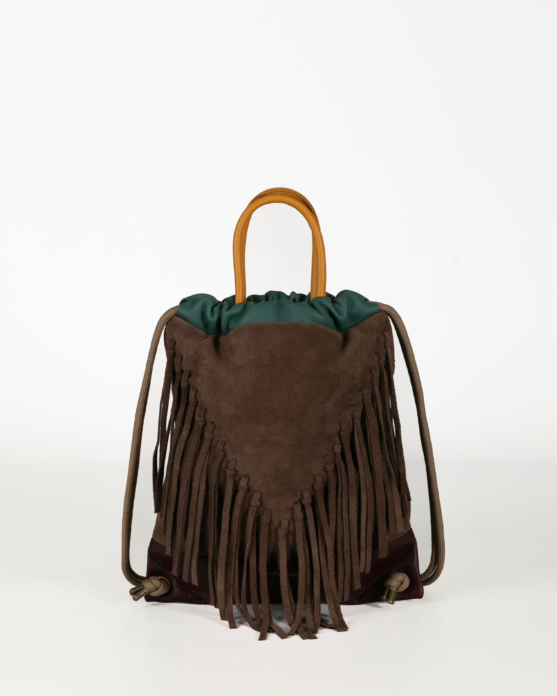 Mochila para mujer con flecos Torimbia Mimique de piel y serraje ante topo. Calidad made in Spain. Ligera y segura