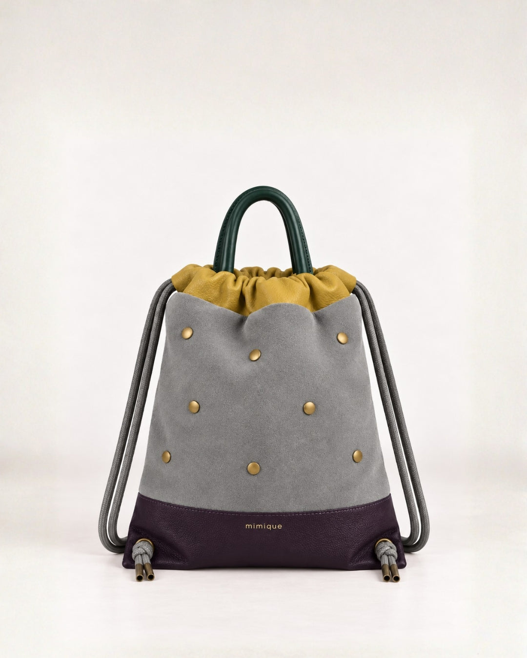 Tachuelas mini gris mochilas de piel y ante para mujer de Mimique hecha a mano en España